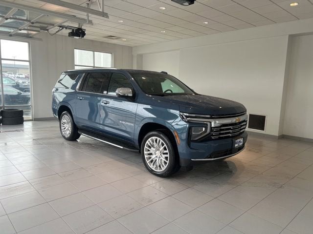 2026 Chevrolet Suburban Premier in Lakeshore Blue Metallic — front three-quarter view