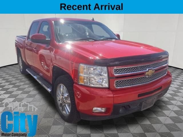 2012 Chevrolet Silverado 1500 LTZ in Victory Red — front three-quarter view