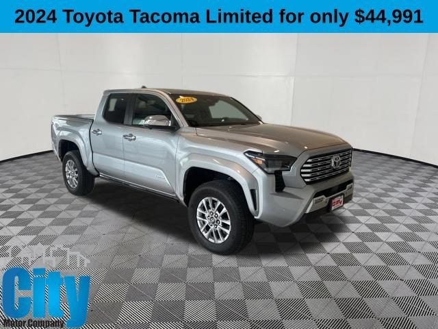 2024 Toyota Tacoma 4WD SR5 in Silver — front three-quarter view