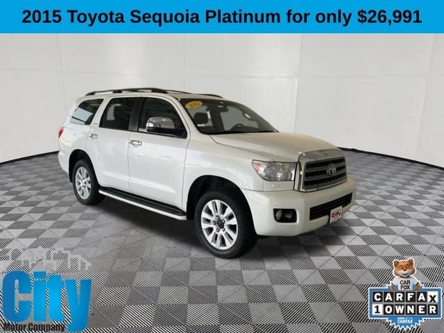 2015 Toyota Sequoia Platinum in White — front three-quarter view